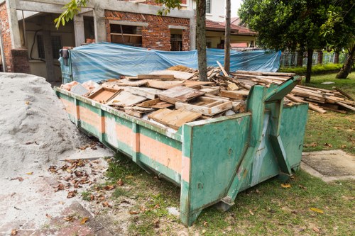 Residents disposing of furniture in New Cross neighborhood